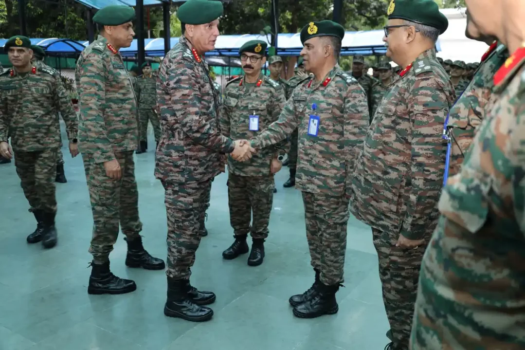 General Dhiraj Seth Shaking Hands