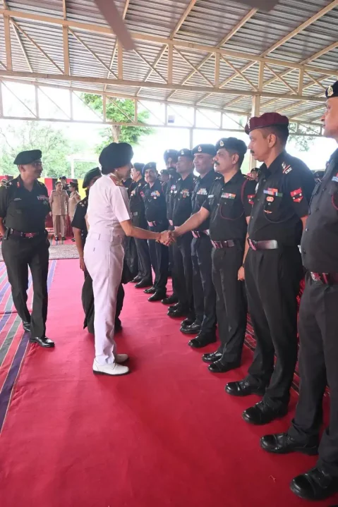 Surg VAdm Arti Sarin Shaking Hands