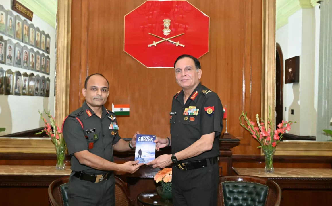 Gen Dhiraj Seth Getting Book from Officer