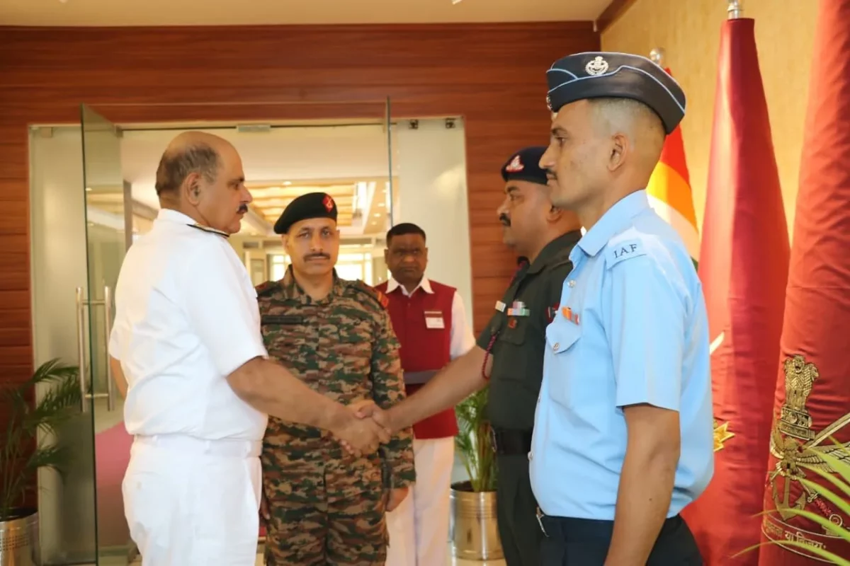 Vice Adm Vineet McCarty Shaking Hands