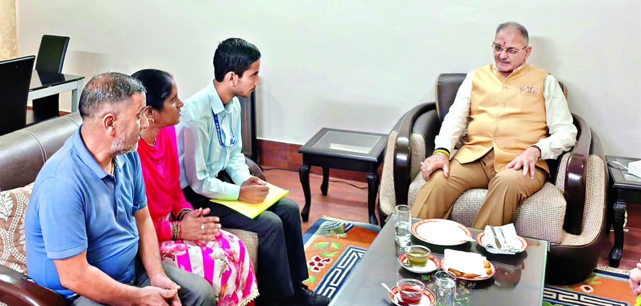governor kavinder gupta with sarvesh sharma and his parents