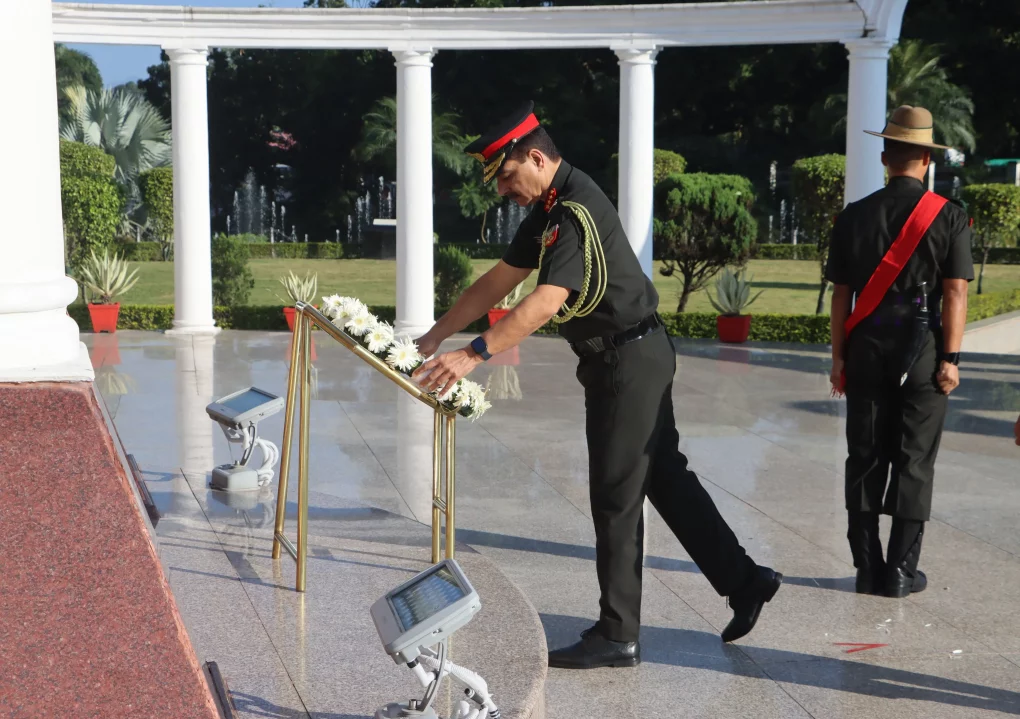 Officer Paying Wreaths